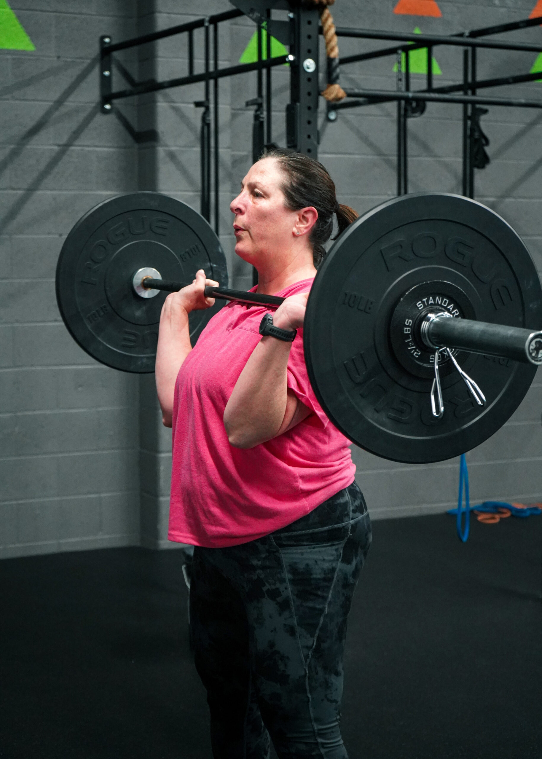 Primedy member setting up for a barbell deadlift